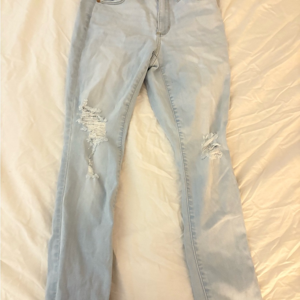 light blue ripped skinny jeans